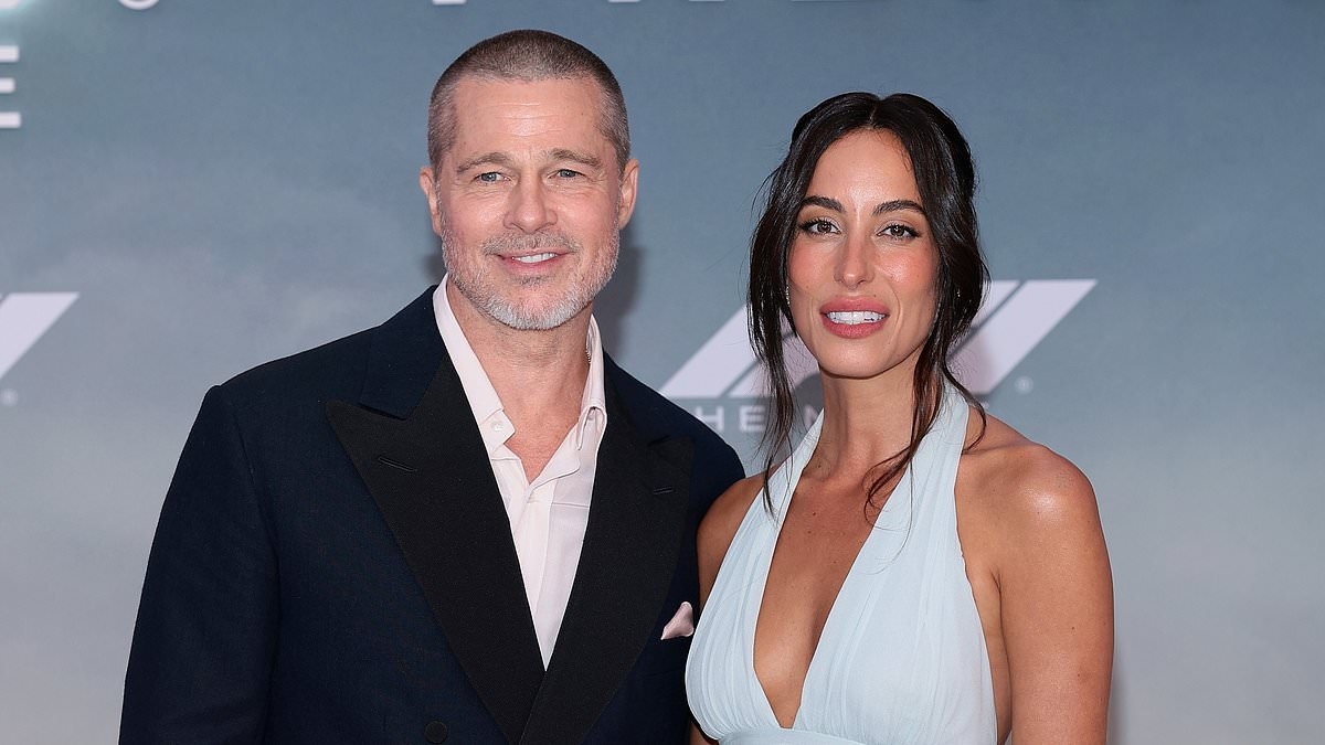 Brad Pitt interview is gatecrashed by F1 star at Times Square premiere of new film - as duo joke about their outfits on the back of Mercedes star's Canadian Grand Prix win