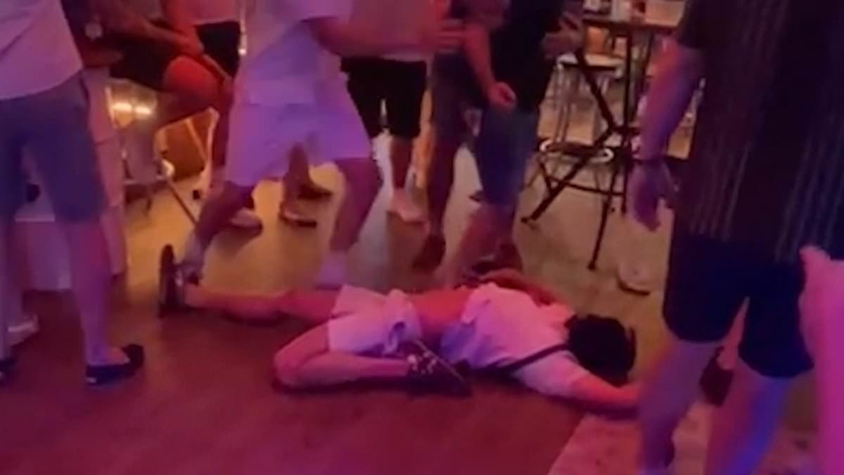 EXCLUSIVE Moment Brit is knocked unconscious after getting sucker-punched by Benidorm local while arguing with bouncers