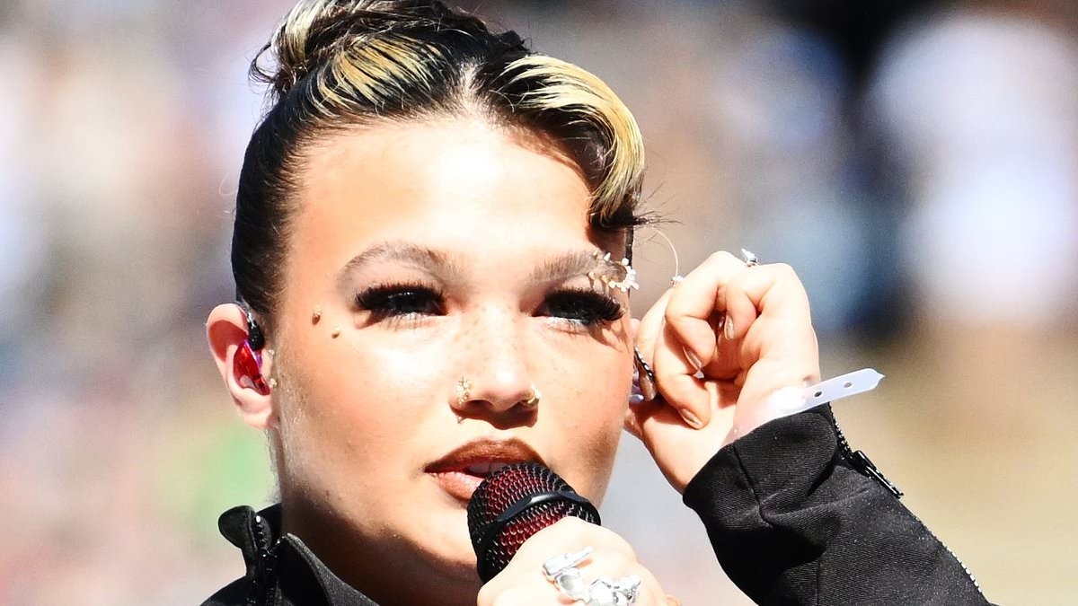 Moment Lola Young breaks down in tears at Capital's Summertime Ball after her performance was hit by technical issues leaving her pleading to fans for help