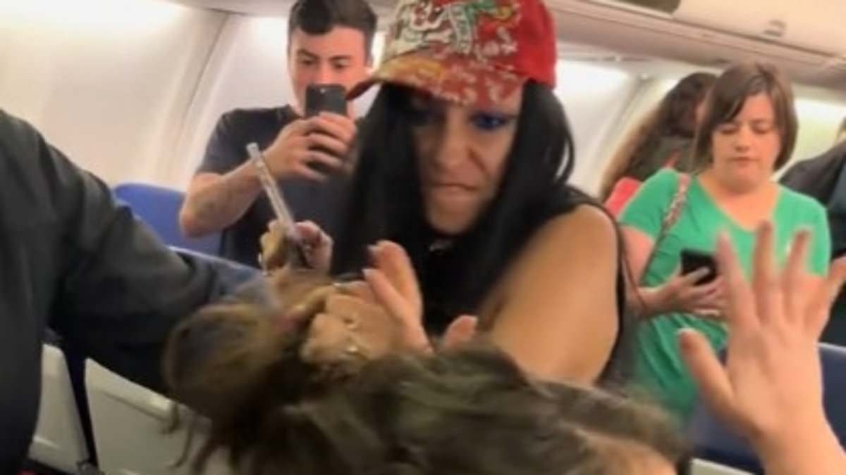 Drunk plane passenger's violent outburst over being forced to sit next to 'fat' woman