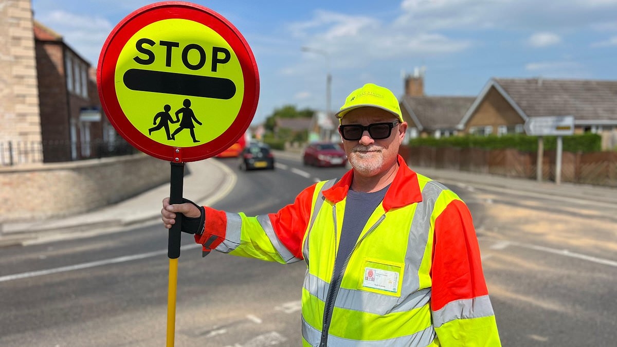 Council bans lollipop man from high-fiving children as they cross the road because of health and safety concerns and claims it 'slows down traffic'