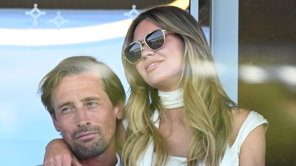 Abbey Clancy packs on the PDA with husband Peter Crouch as the couple put on an amorous display during day two of Royal Ascot