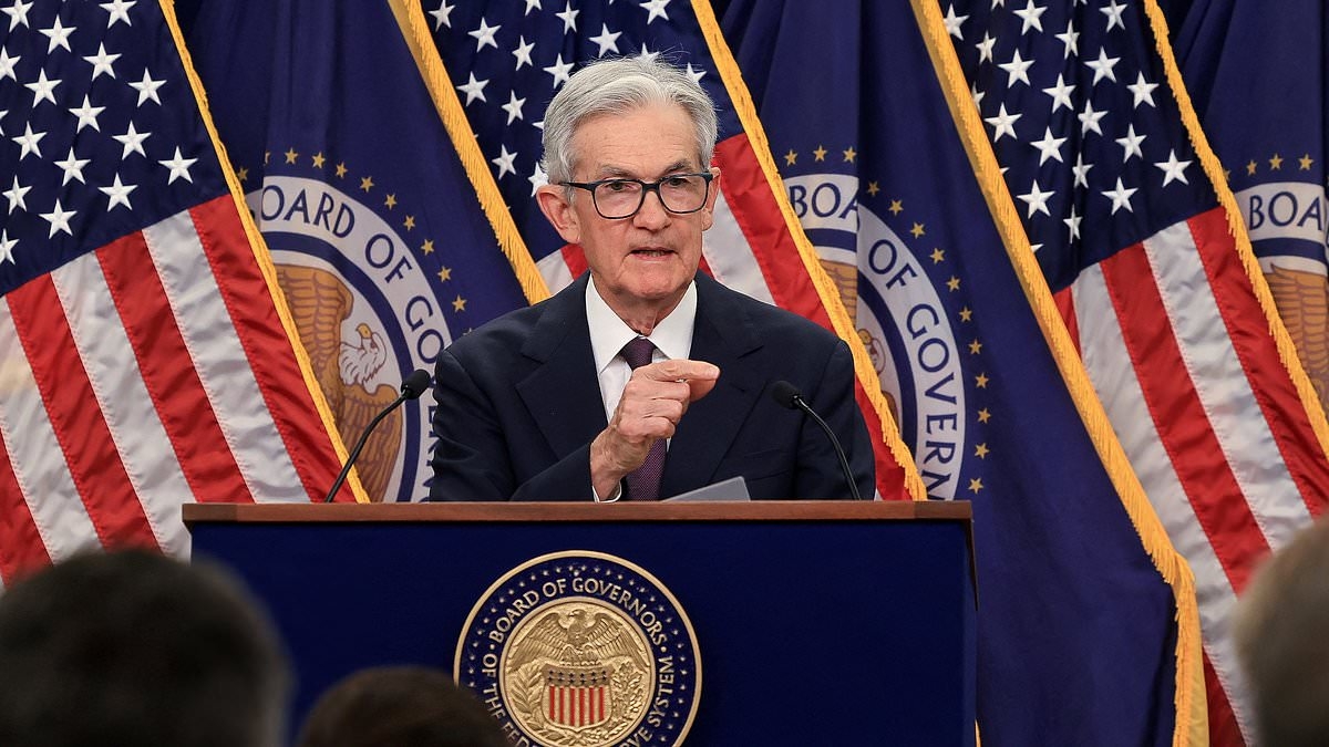 Fed risks Trump's wrath by holding rates steady