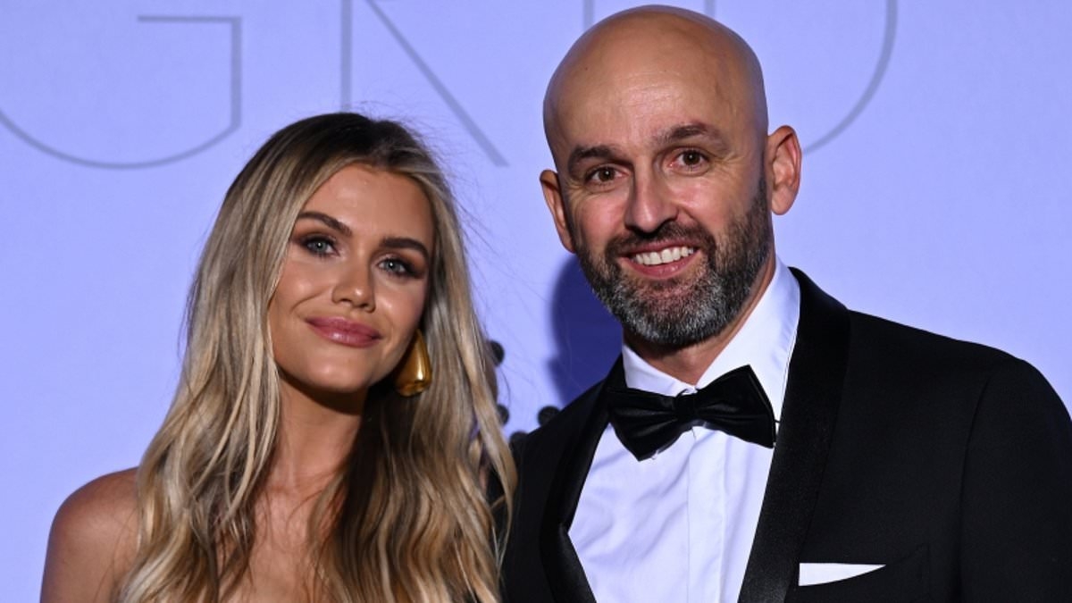 Cricket WAG Emma Lyon wears thousands of dollars worth of jewels and accessories as she shows off her cleavage during date with husband Nathan in London