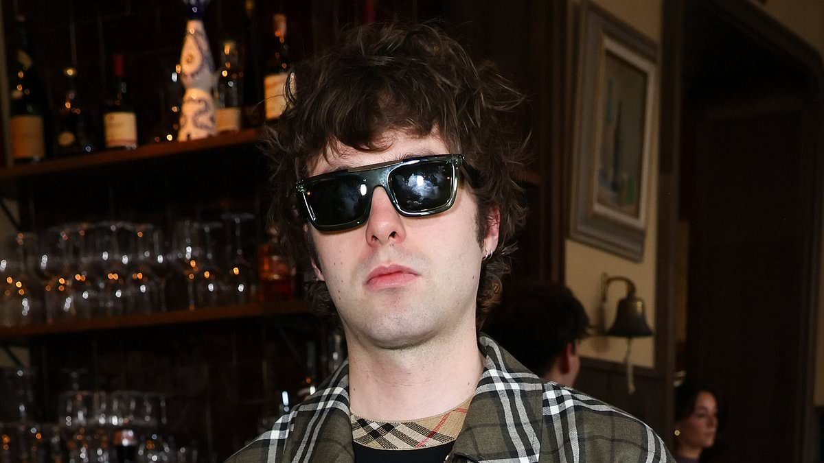 Lennon Gallagher keeps it causal in khaki plaid jacket as he joins a stylish Keisha Buchanan and Mia Regan at the Burberry Festival Pub Quiz