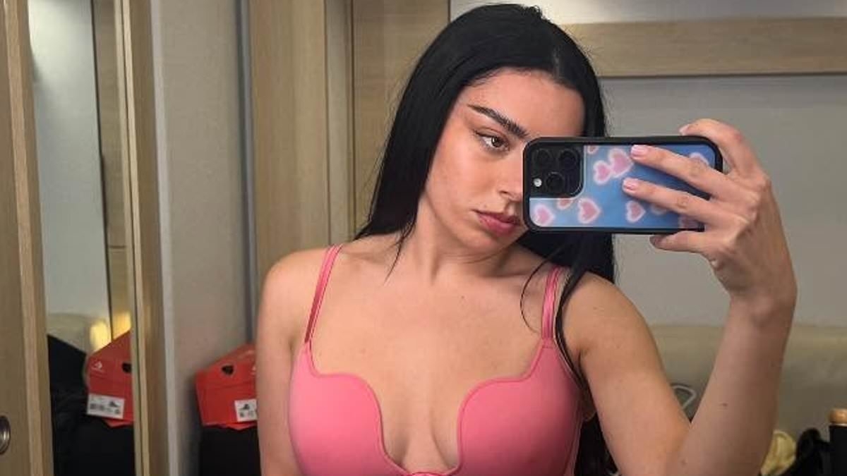 Charli XCX showcases her incredible figure in a skimpy pink lingerie set before slipping into racy festival fit in sizzling new photo dump