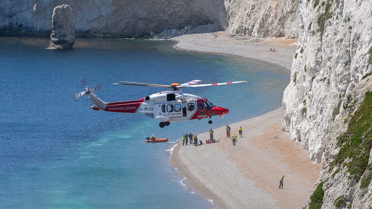 Woman in her 30s dies at Durdle Door beauty spot on hottest day of the year - as government scientists issues alert over 'killer' temperatures
