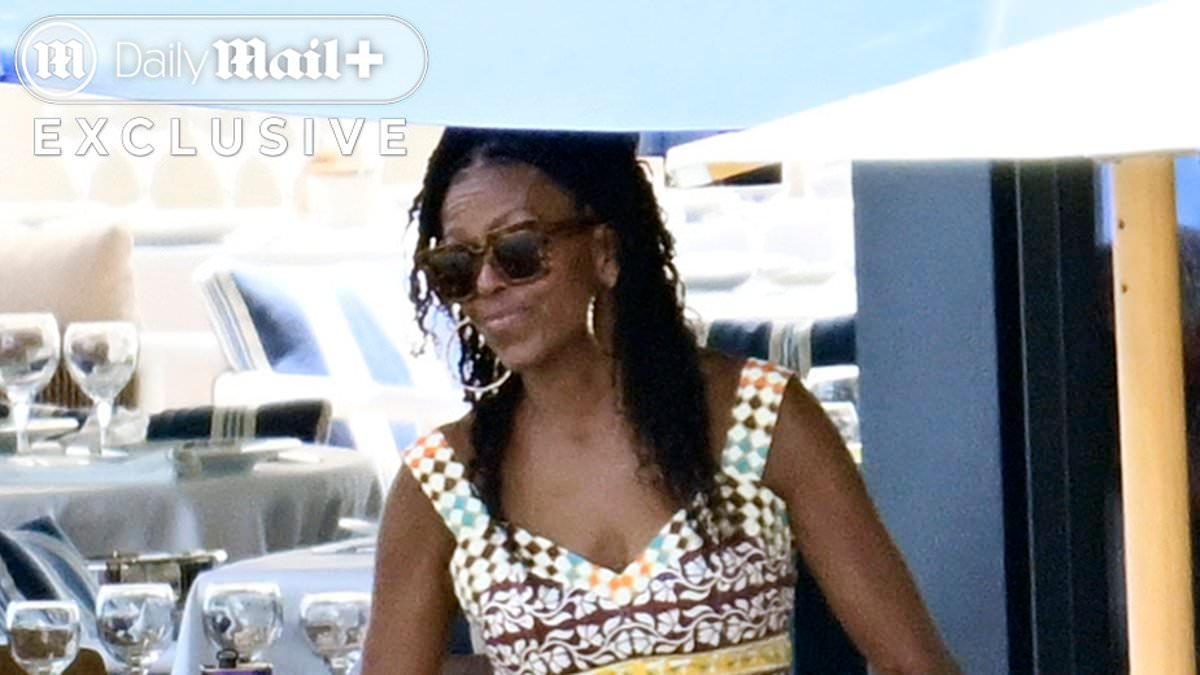 EXCLUSIVE Michelle Obama enjoys intimate lunch with longtime male friend as she jets off on lavish Spain getaway WITHOUT Barack
