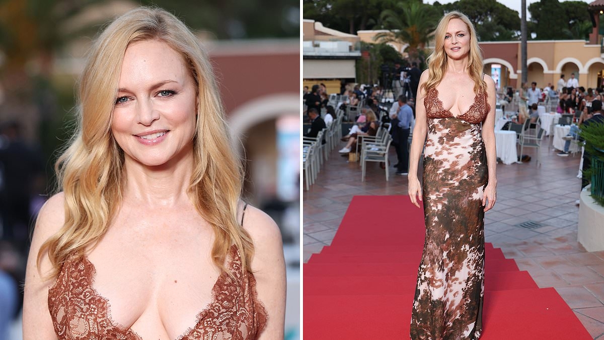 Braless Heather Graham, 55, pulls off another age-defying look as she sizzles in risque gown