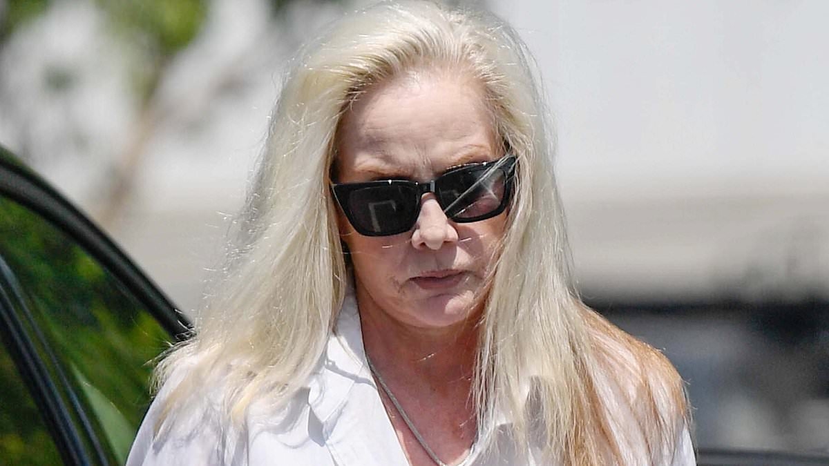 EXCLUSIVE 70s rock legend played by Dakota Fanning is still platinum blonde at 65... can you guess who she is?