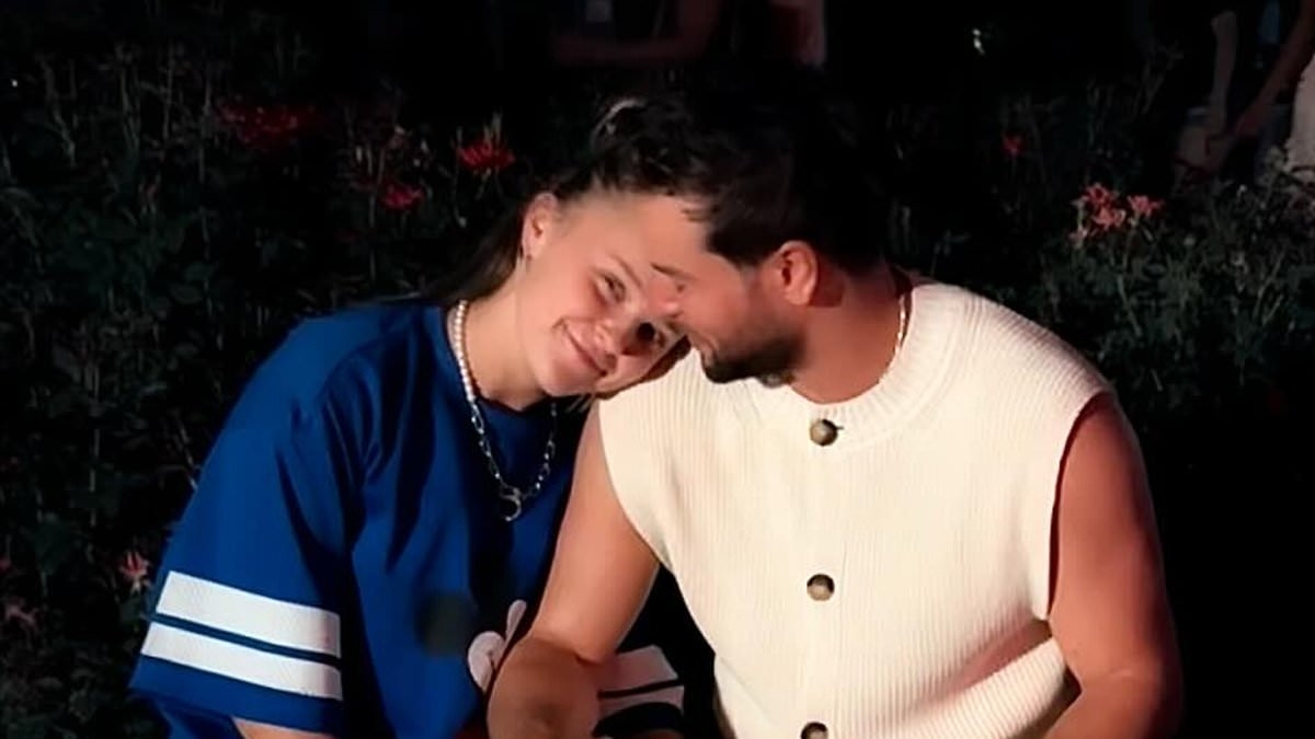 JoJo Siwa gushes over boyfriend Chris Hughes and quips they've already discussed marriage as she admits she 'wishes he was with her' after she flew home to the US