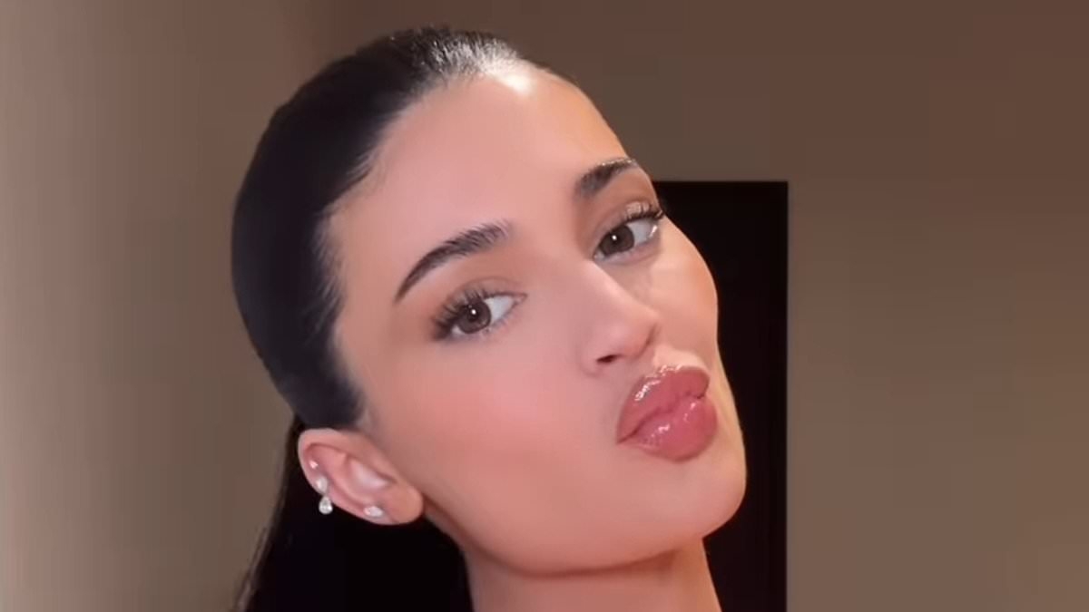 Surgically enhanced Kylie Jenner nearly spills out of top after finally admitting to boob job regret