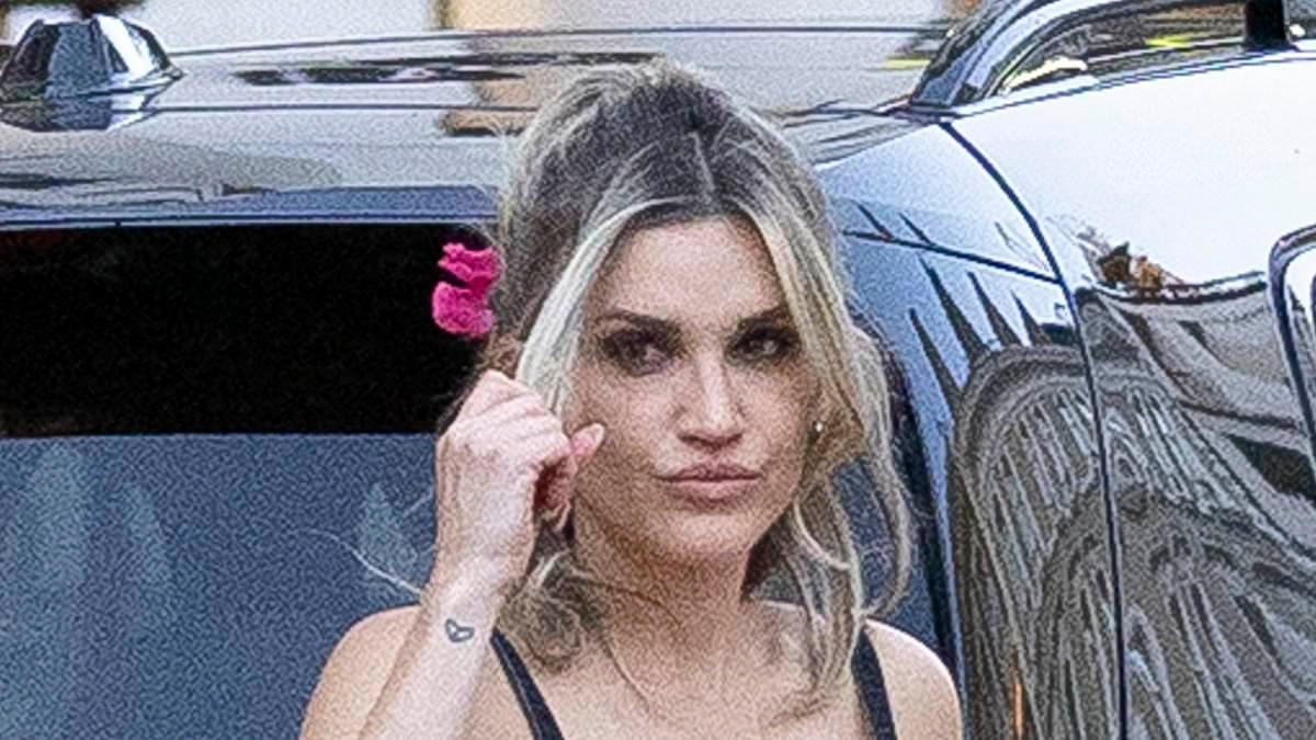Ashley Roberts puts on a leggy display in a stylish denim co-ord set as she hails a taxi in Soho