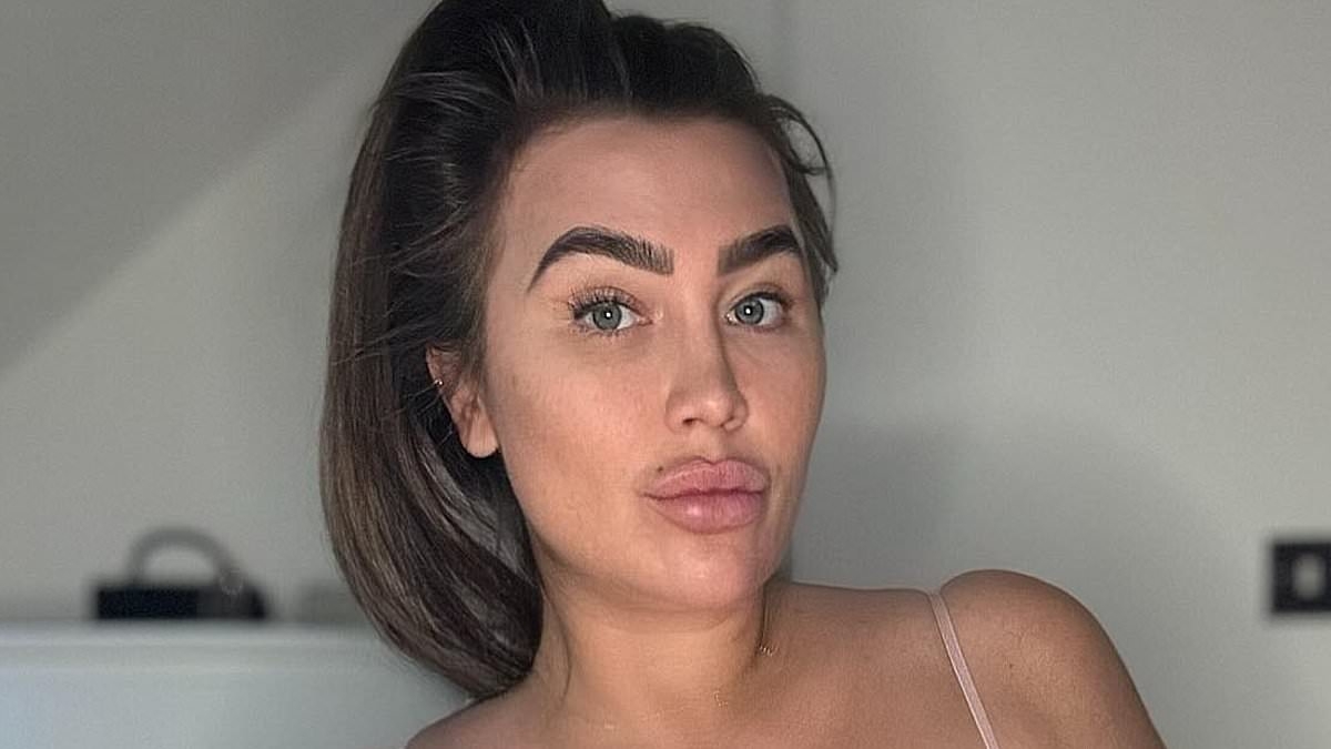 Lauren Goodger hits back at trolls who mocked her looks after she revealed she's having her 'heavy' breast implants removed for a 'natural look'