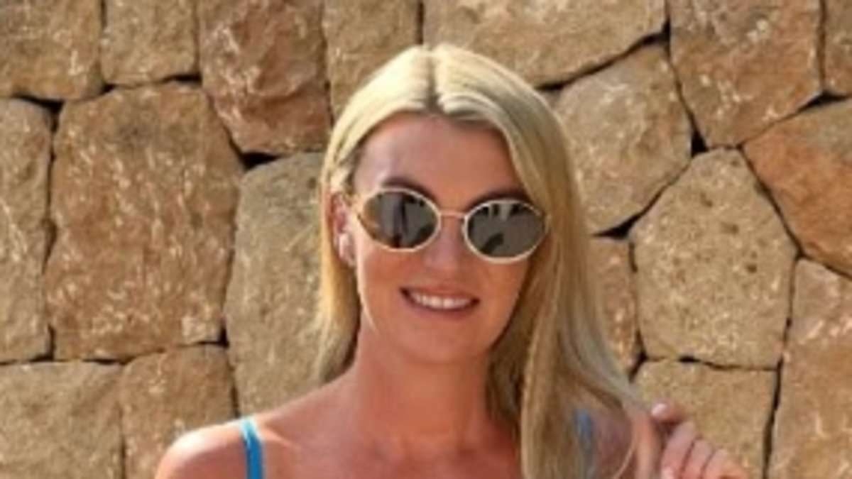 Billi Mucklow shows ex Andy Carroll what he's missing as she sizzles in stylish bikinis while soaking up the sun in Mallorca