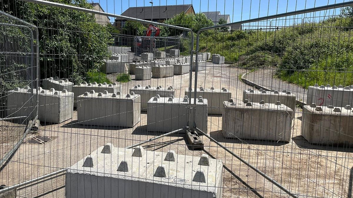 'Great Wall of Devon' landowner wages war with neighbours AGAIN after building six foot concrete barrier to block locals