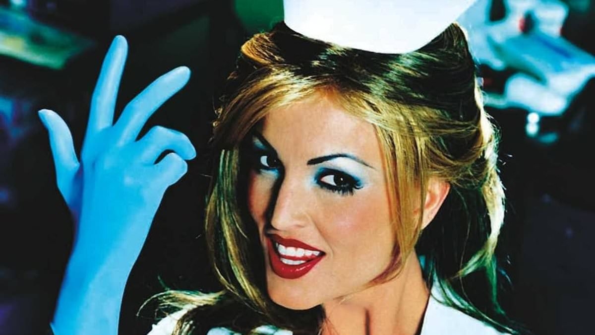 Busty Blink 182 album model looks worlds away from iconic cover 26 years on