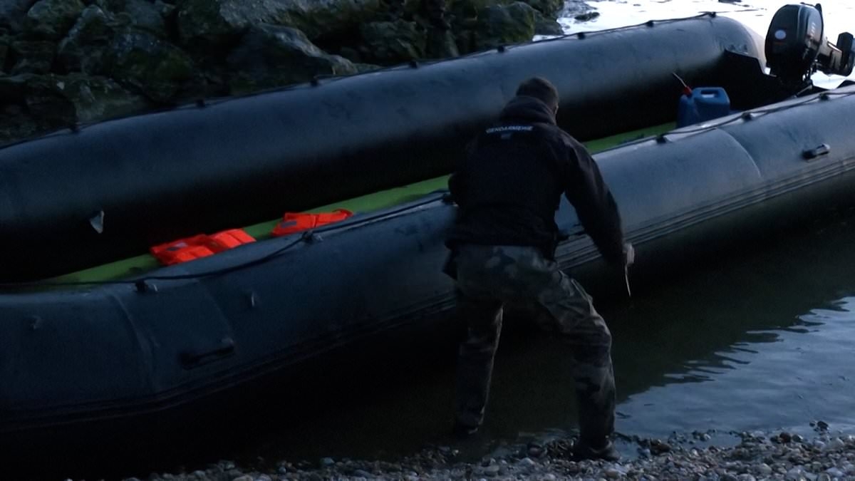 Moment the French FINALLY try to stop the boats: Police slash rubber dinghy with knife but migrants say 'we're not afraid to die' in bid to reach UK as another 1,634 arrive in last week