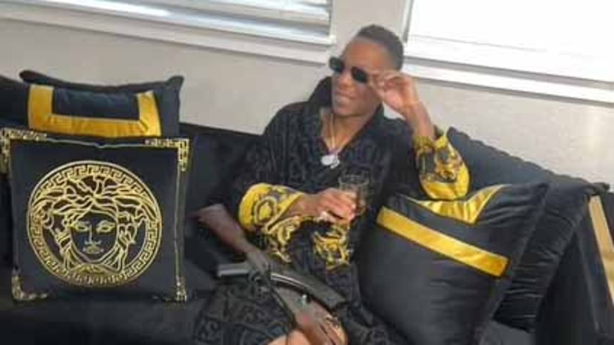 Versace robe-wearing pimp who bragged about his sordid acts online is jailed for human trafficking