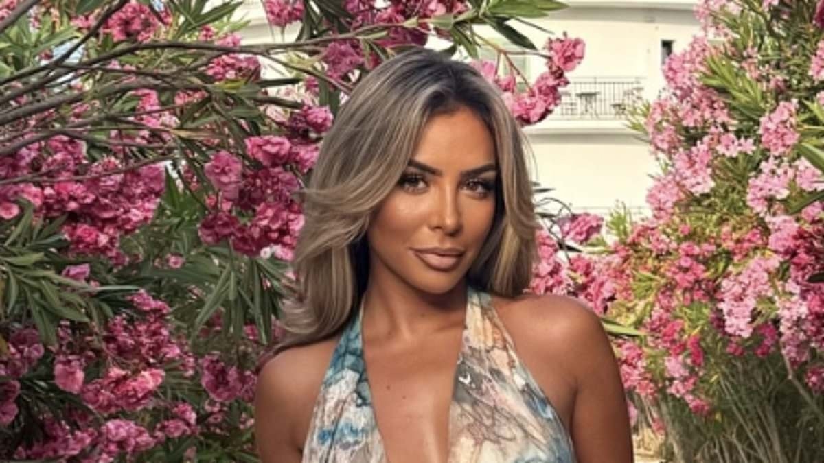 TOWIE's Elma Pazar stuns in a plunging blue marble print dress as she shares cryptic post after split from Sammy Root while partying in Ibiza