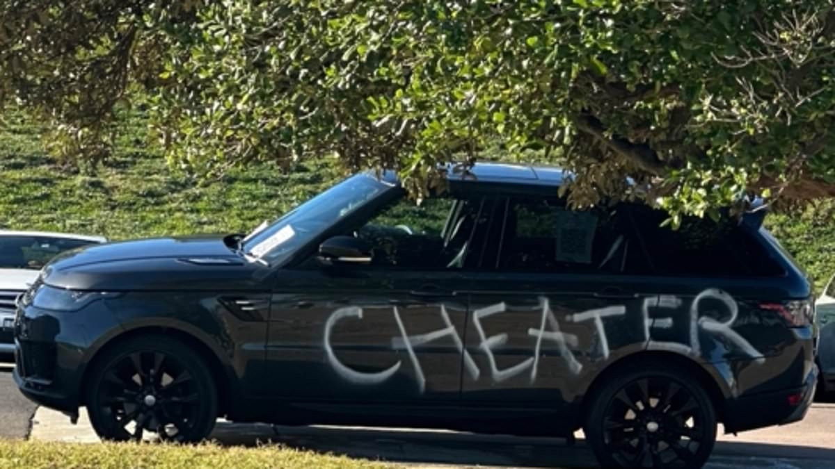 Sydney's Eastern Suburbs rocked by cheating scandal as mystery Range Rover is spray-painted with brutal message