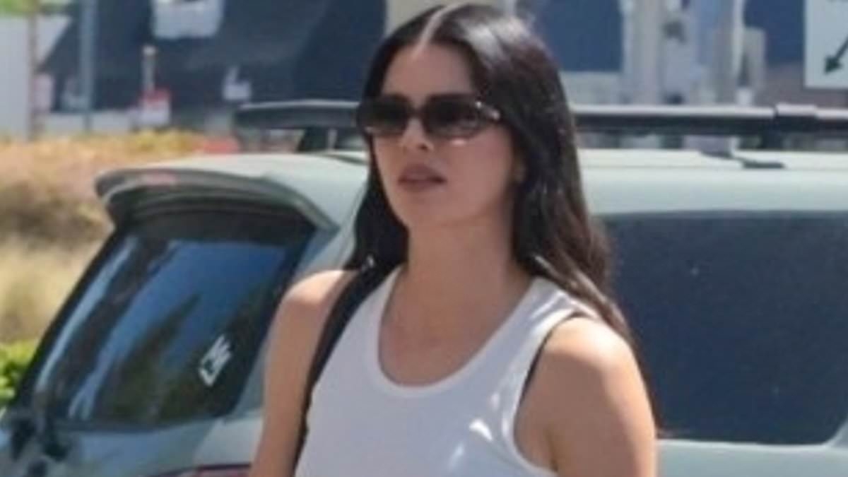 Kendall Jenner shows ex Bad Bunny what he's missing in tight white tank top on steamy summer outing