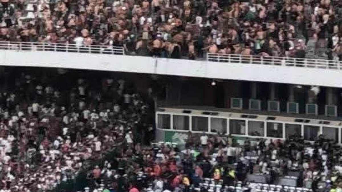 Three football fans dead and 70 injured in horror of Algeria stadium disaster - as supporters fall from stand after barrier breaks amid title celebrations