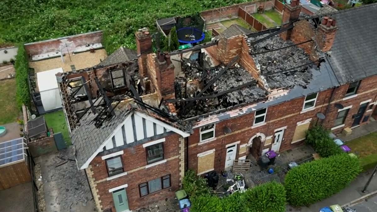 Three in hospital after exploding vape left charging on a bed blows up four terraced houses
