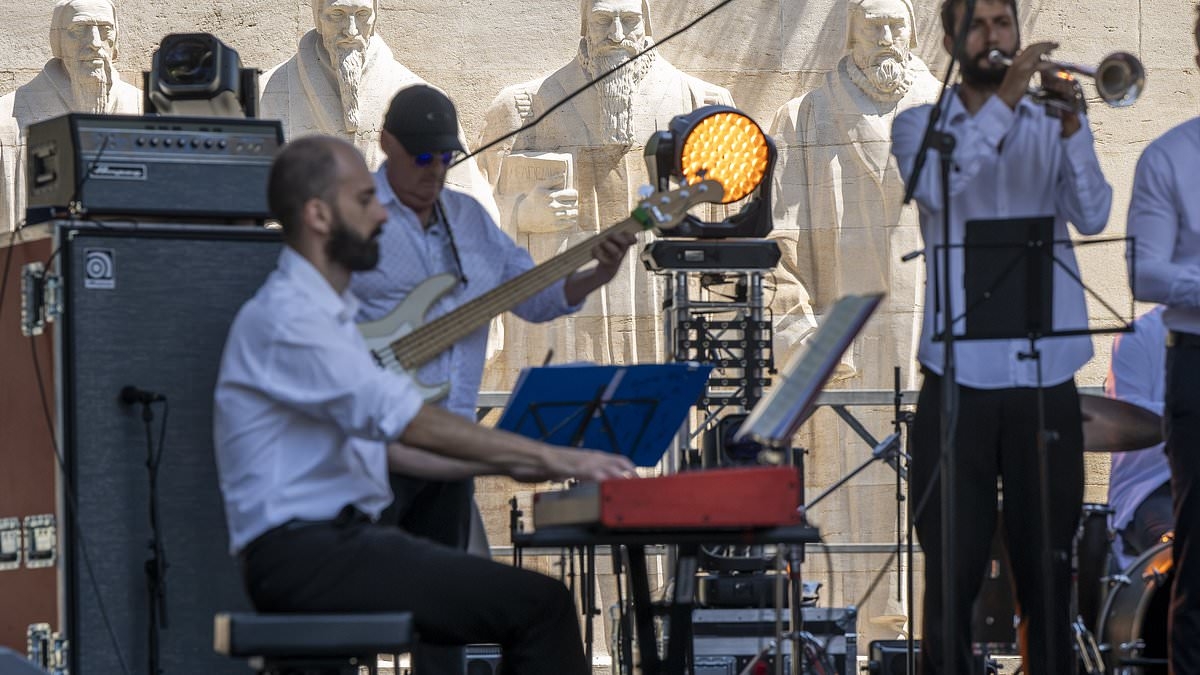 Twelve people are arrested after 145 people report being pricked by SYRINGES across international music festival