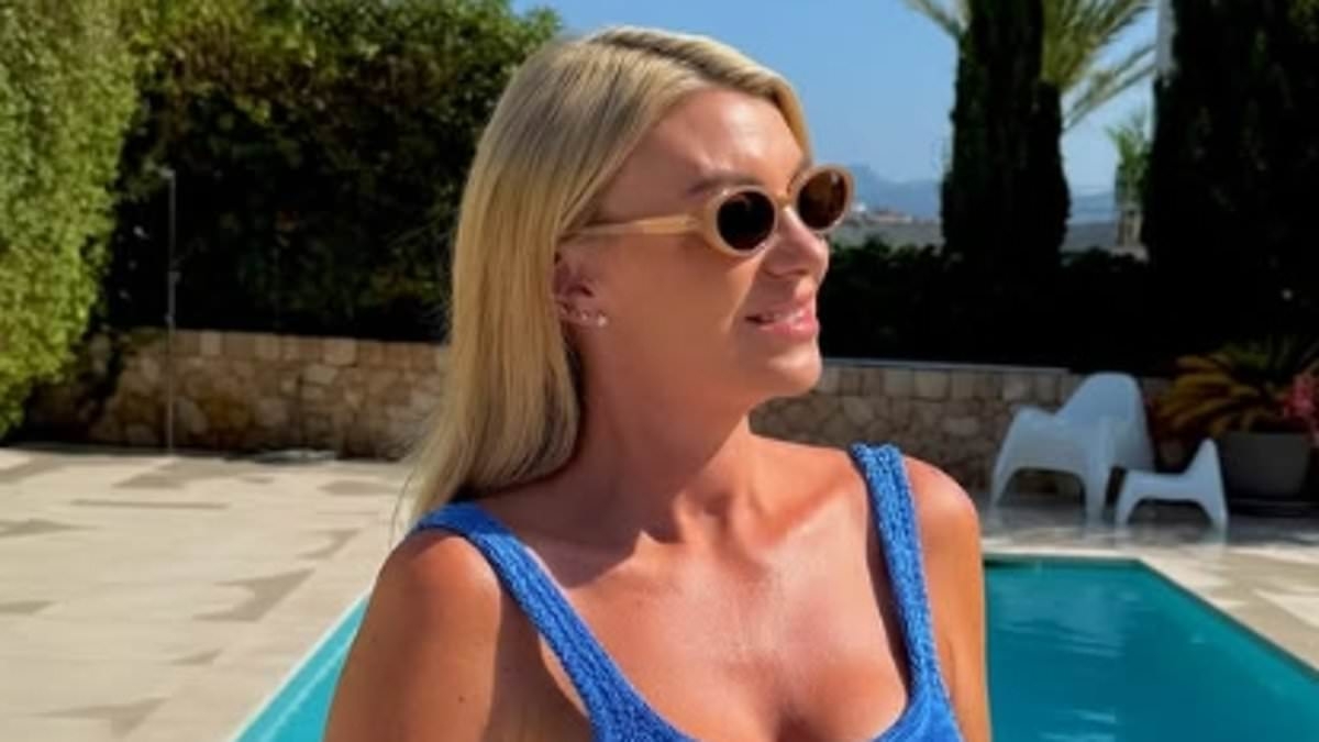 Billi Mucklow looks sensational in a blue swimsuit and stylish holiday snaps - after her ex Andy Carroll was 'questioned by police over bust-ups with girlfriend Lou Teasdale'