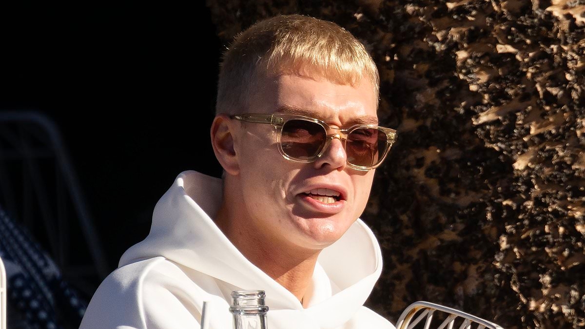 Jack Vidgen appears in good health as he attends church service with his mother after seventh stint in rehab