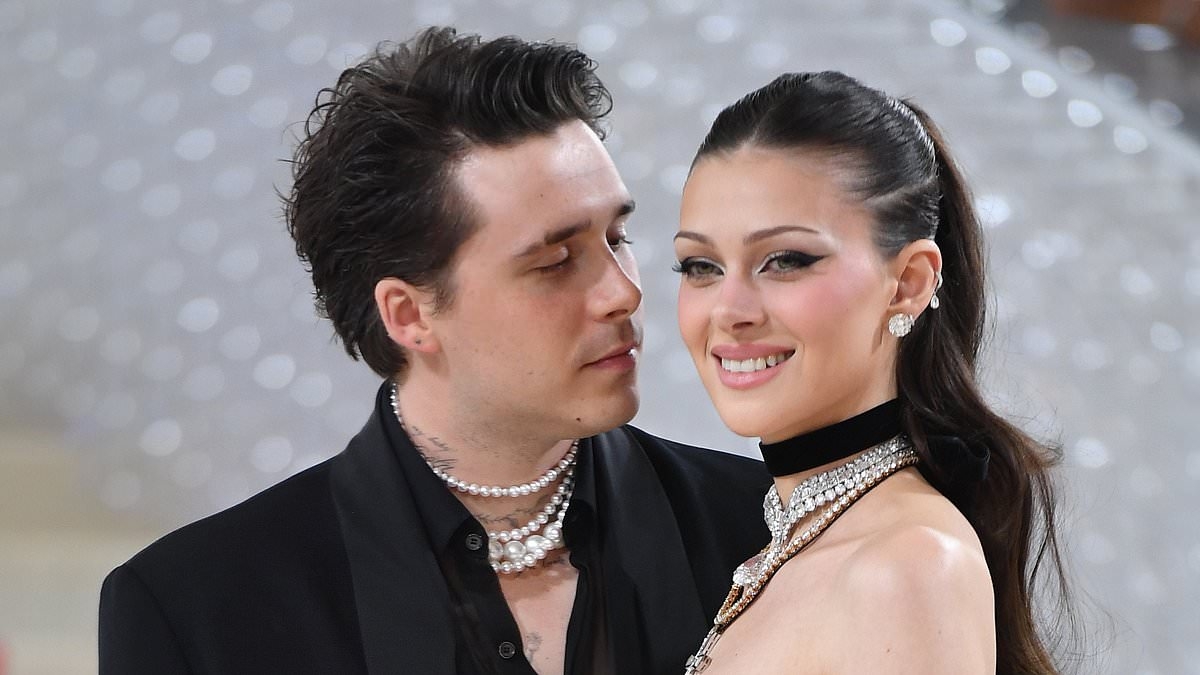 Brooklyn Beckham is 'obsessed' with Nicola Peltz and his parents are deeply worried by his infatuation, reveal alarmed friends - as fans highlight his 'creepy' behaviour: DOLLY BUSBY