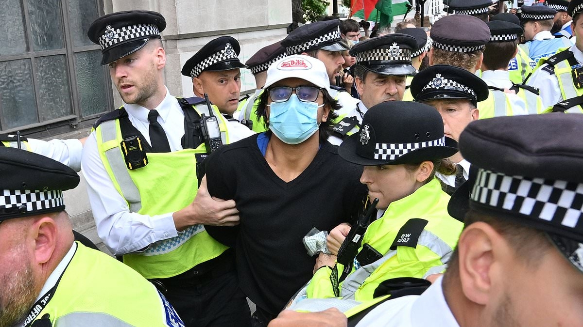 BREAKING NEWS Palestine Action activists blocks streets and clash with police in Trafalgar Square demonstration - as government moves to ban group following RAF base protest