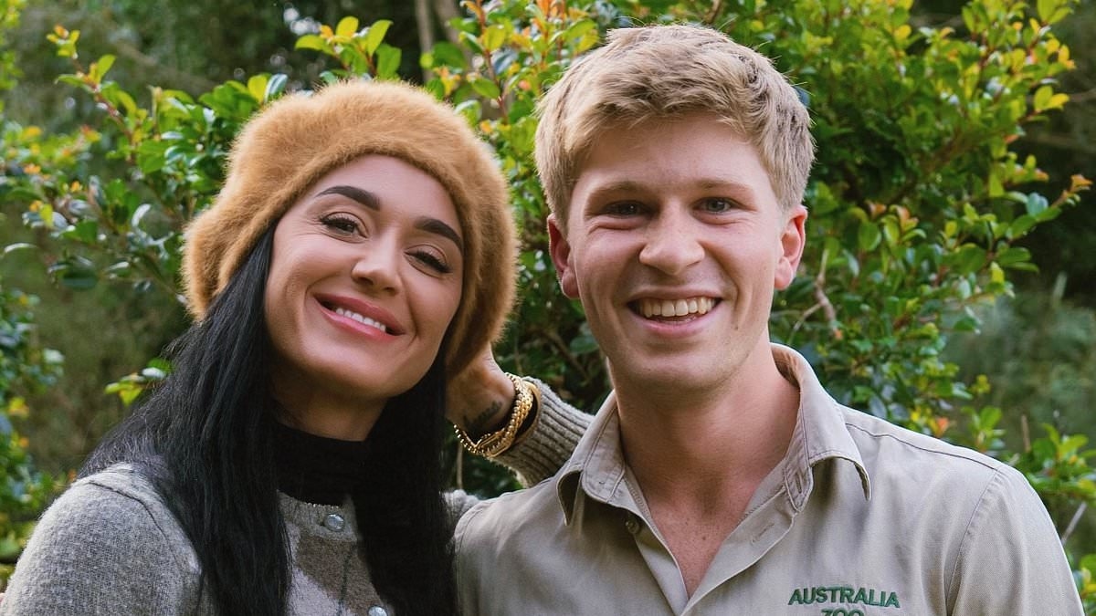 Katy Perry left sprawling on the floor as Robert Irwin drops her after the pop star asked him to dance during visit to Australia Zoo