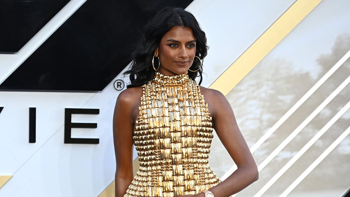 Simone Ashley steals the spotlight in dramatic gold dress for F1: The Movie premiere despite her scenes being cut from Brad Pitt film
