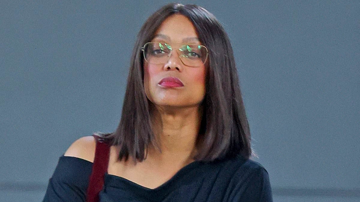 Supermodel Tyra Banks shows off her unique style in harem pants as she samples ice cream flavours at her new Sydney store