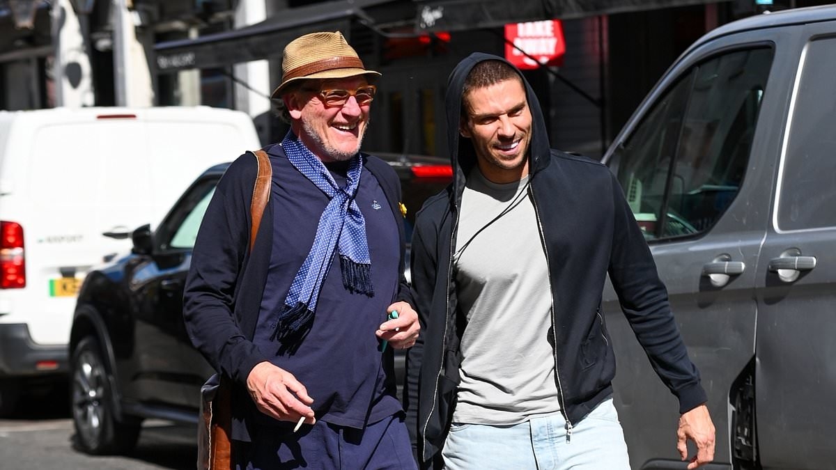 Joey Essex makes an unlikely appearance with MobLand star Geoff Bell during day out in London - after launching new career in boxing