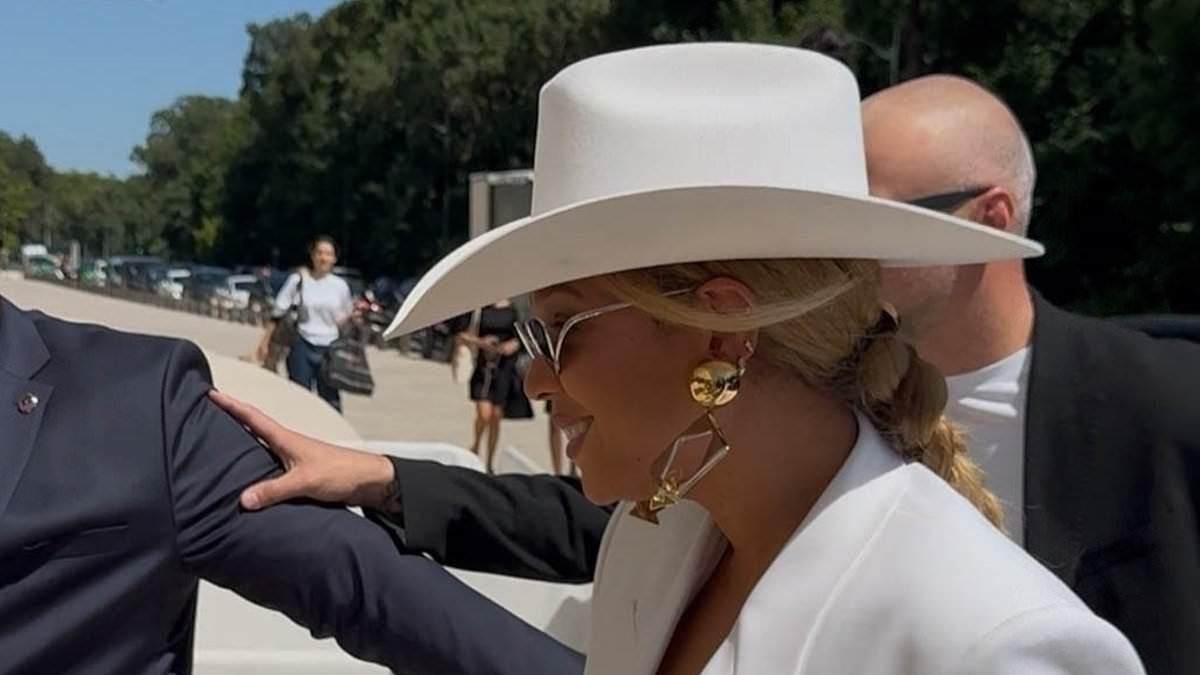 Beyonce embodies country chic as she arrives at Louis Vuitton foundation in Paris in a tailored white suit with shoulder pads and a cowboy hat