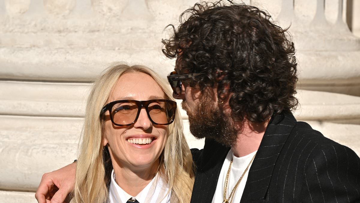 Aaron Taylor-Johnson, 35, puts on a loved-up display with his wife Sam, 58, as they attend Saint Laurent Menswear show during Paris Fashion Week