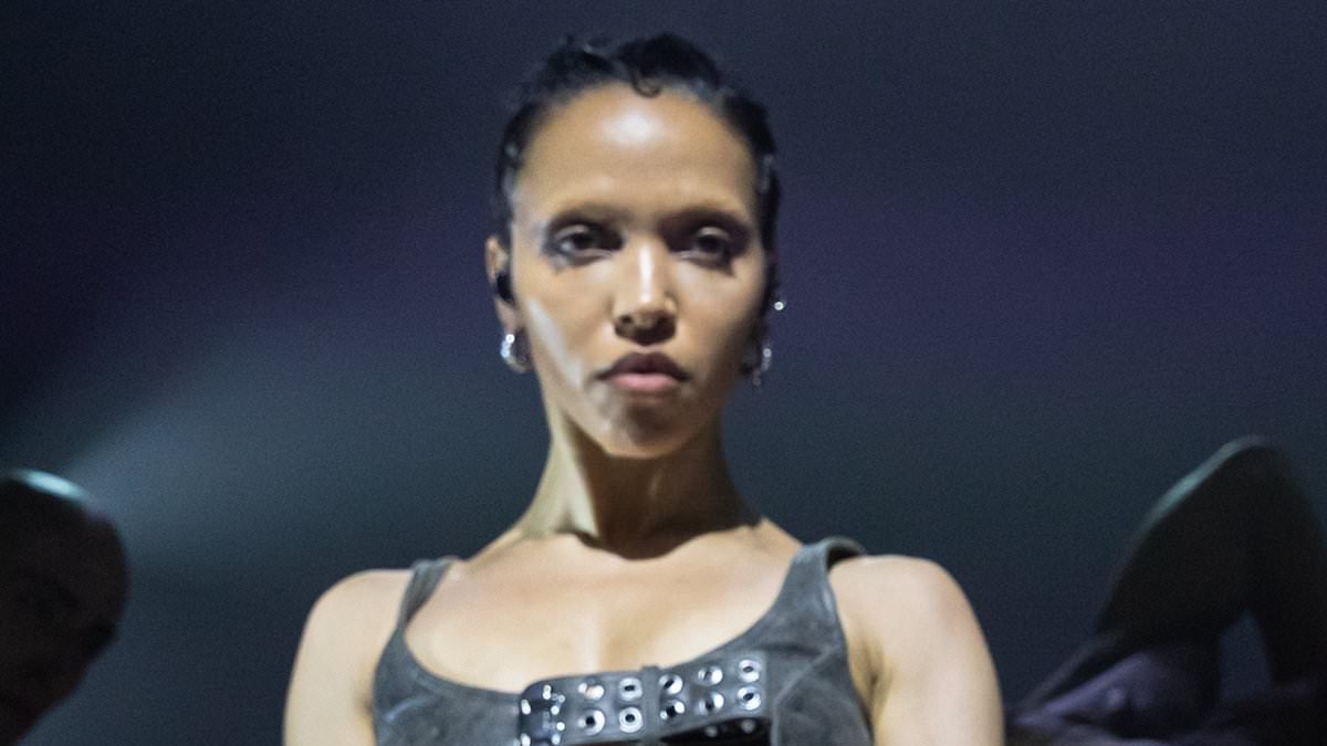 FKA twigs puts on a sexy performance in buckled black leather bra and hotpants in Chicago