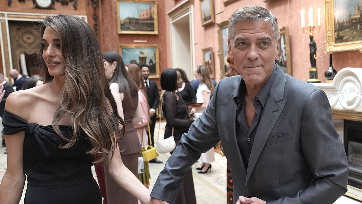 George Clooney and wife Amal hold hands as they mingle with King Charles at Buckingham Palace