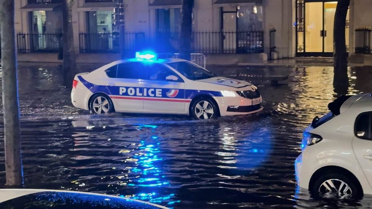 French police patrol flooded streets of Paris while trying to raise spirits with hilarious ICONIC theme tune
