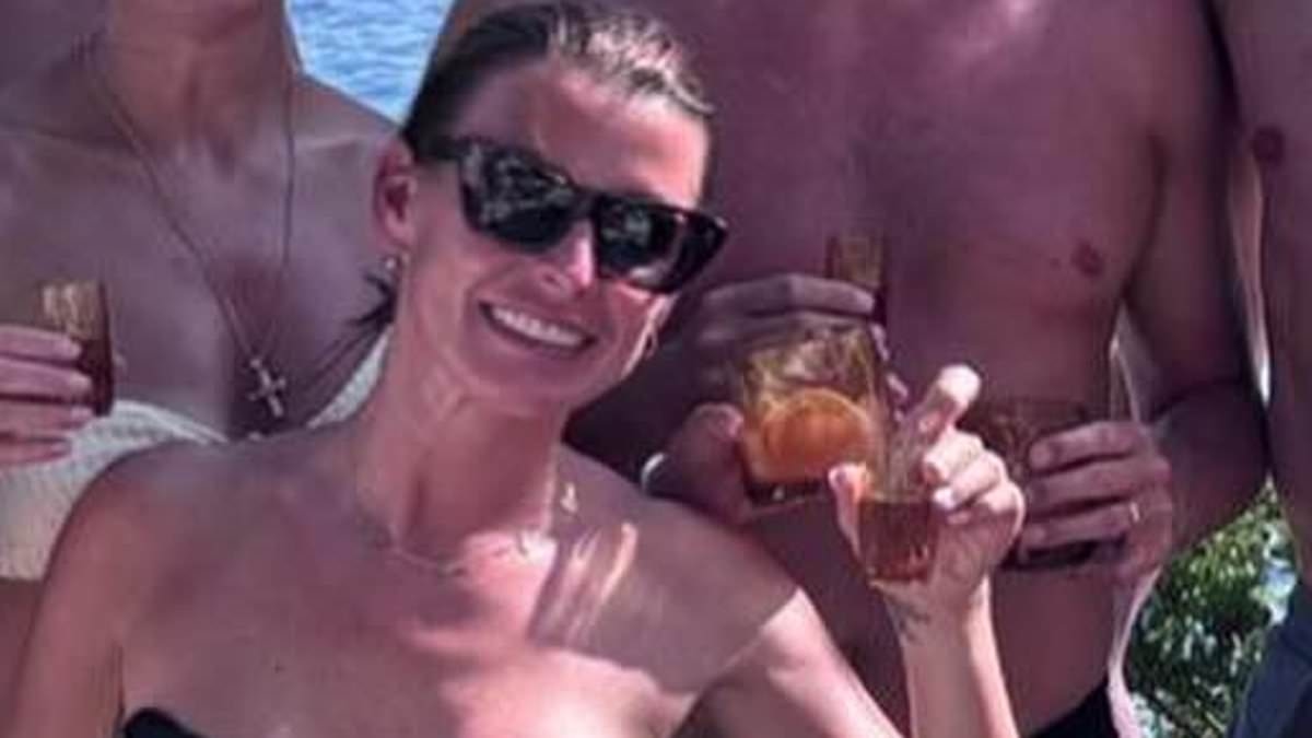 Coleen Rooney looks incredible in skimpy bikini snaps as she parties with Wayne and his Manchester United pals in Ibiza after winning Wagatha Christie battle