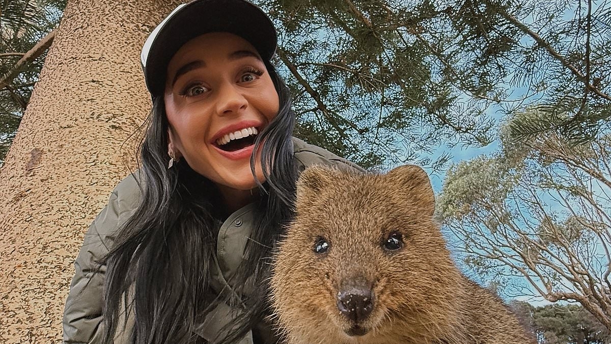 Katy Perry receives a message of support from Lauren Sanchez after ex Orlando Bloom cosied up to another woman - as she posts rare snaps with her daughter in Australia after skipping Venice wedding