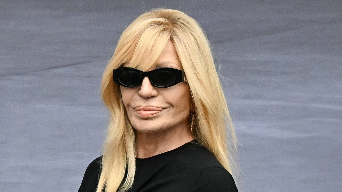 Donatella Versace, 70, is the epitome of elegance in a black midi dress as she attends Dior Menswear show at Paris Fashion Week