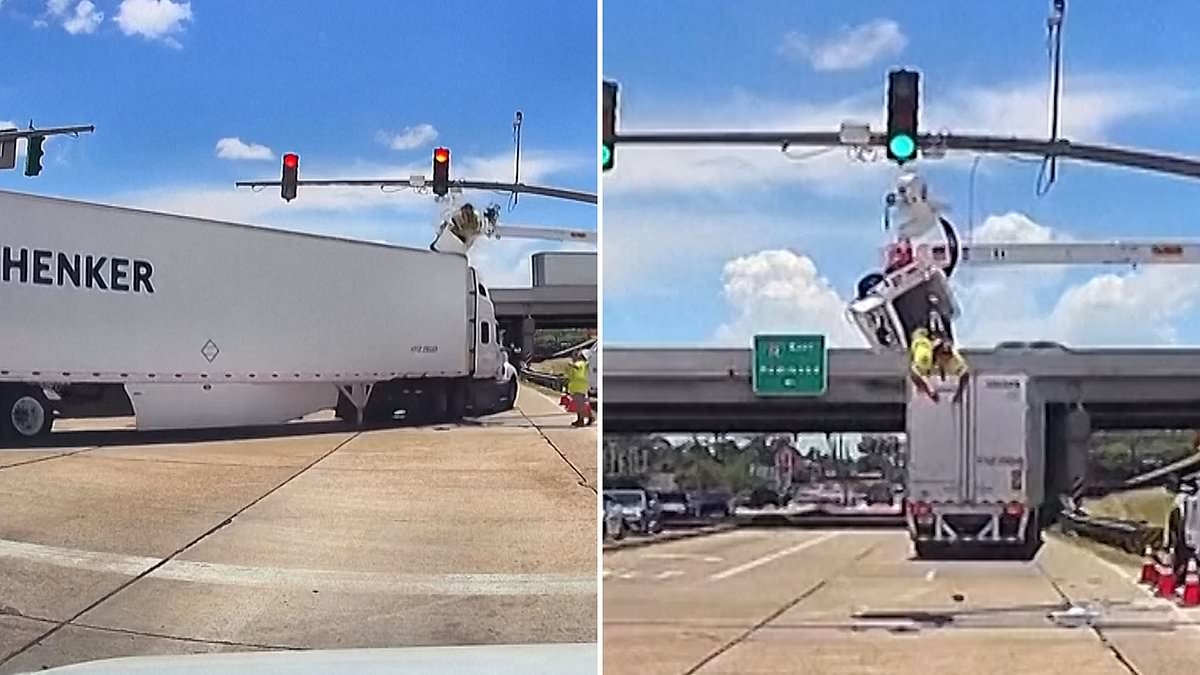 Shocking moment worker fixing traffic lights is flung upside down after 18-wheel lorry rams into cherry picker - but makes a miraculous escape