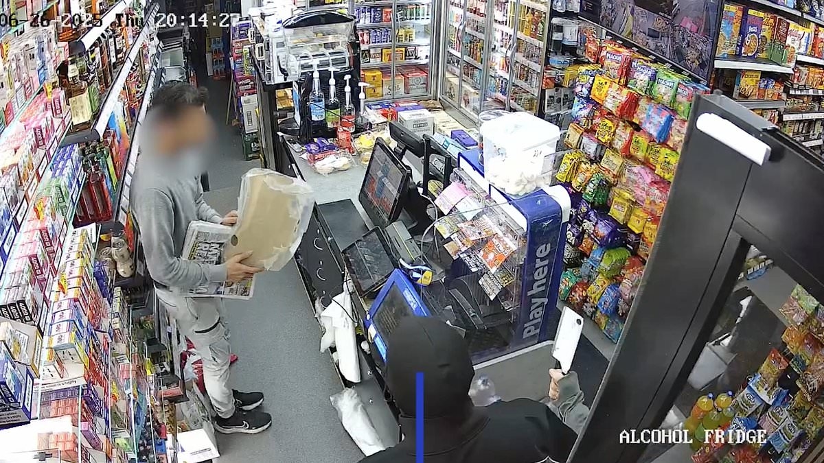 Terrifying moment balaclava-clad robber threatens shop worker with meat cleaver before stealing £2,000 - as police launch manhunt