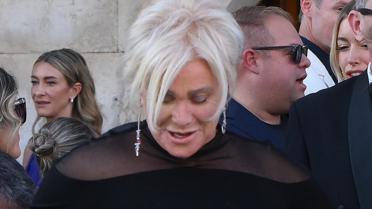 She's living her best life! Deborra-Lee Furness cuts a stylish figure in Venice as she attends lavish Lauren Sanchez and Jeff Bezos wedding - after finalising divorce from Hugh Jackman