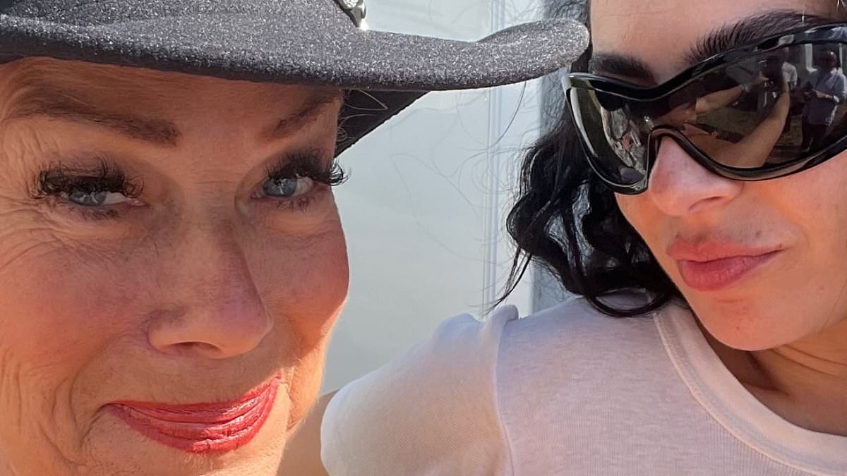 Matty Healy's mother Denise Welch grins alongside pop megastar Charli XCX at Glastonbury ahead of her son's divisive headlining set with The 1975