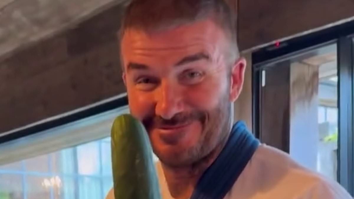 David Beckham displays his bandaged hand in a sling while showing off his homegrown vegetables as he recovers at home after operation on injured wrist